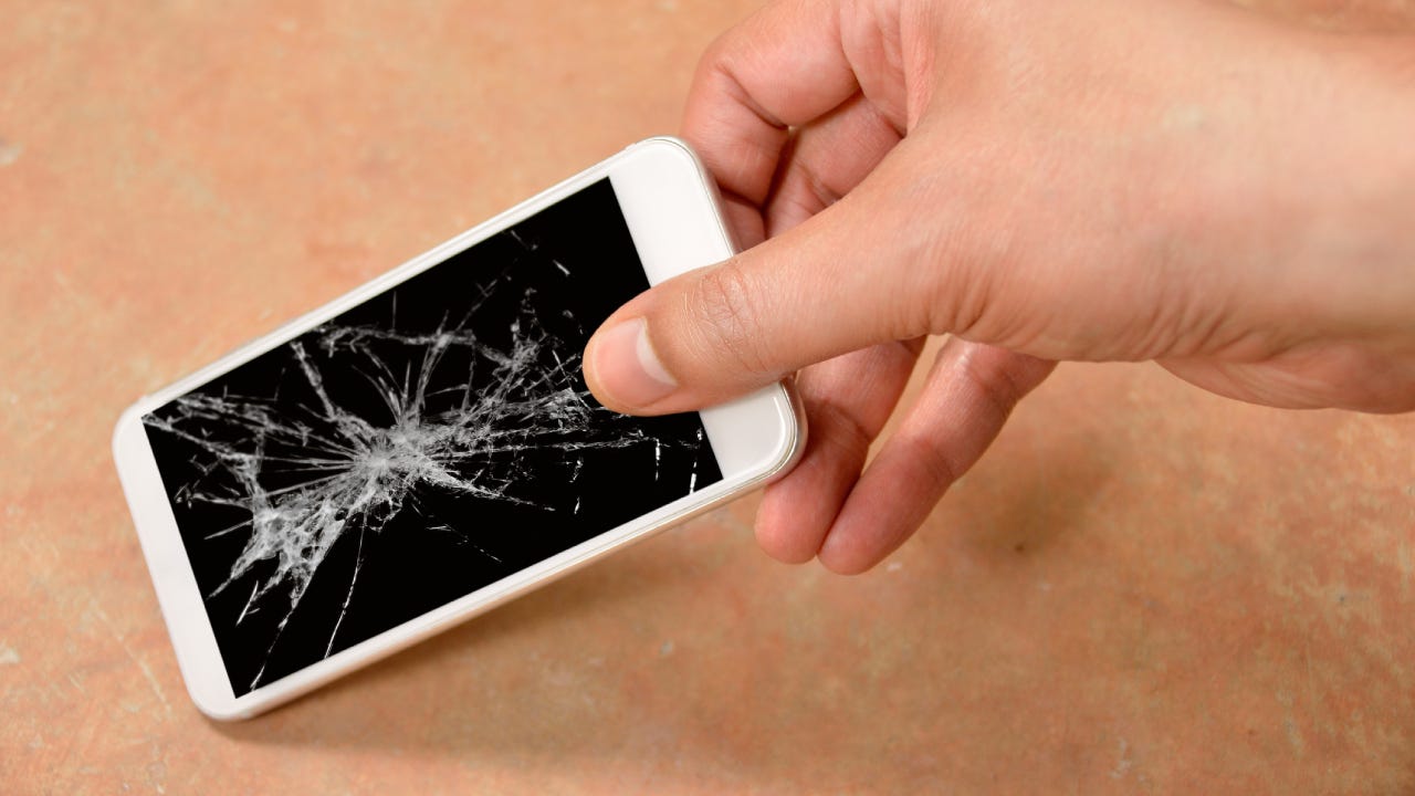 A smartphone with a cracked screen.