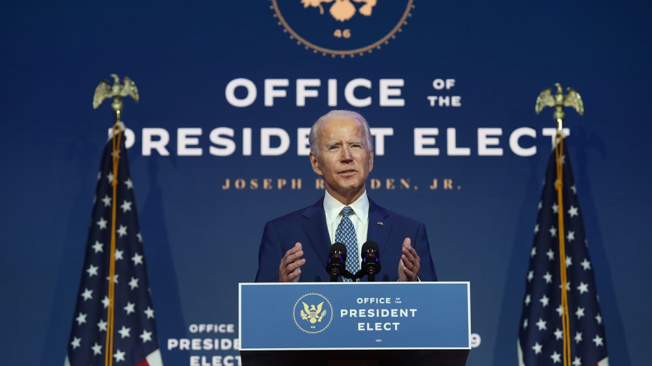 President-elect Joe Biden speaks to the media after the transition advisory board