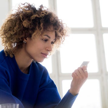 Person holding credit card