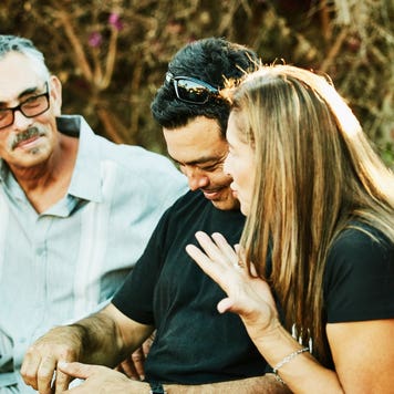 A multigenerational community gather together.