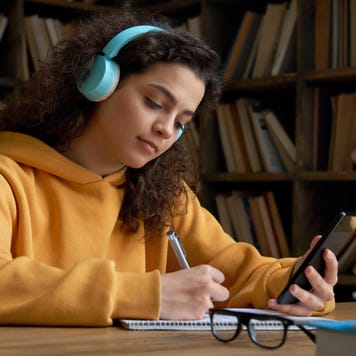 Teen student works on homework