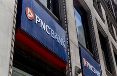 Signage is displayed outside a PNC Financial Services Group Inc. bank branch