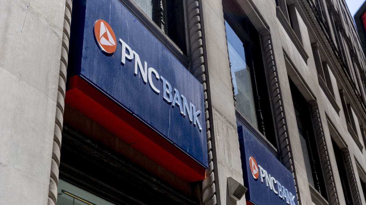 Signage is displayed outside a PNC Financial Services Group Inc. bank branch