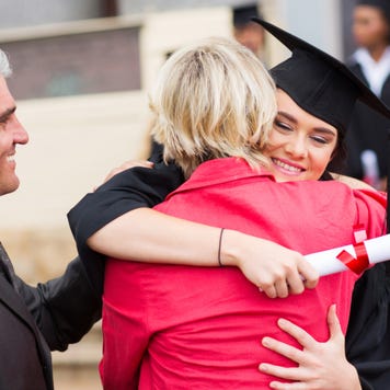 Parents embrace graduating college student