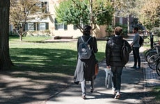 Students walk on Harvard campus