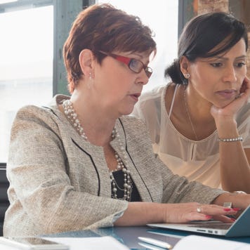 Businesswomen using laptop