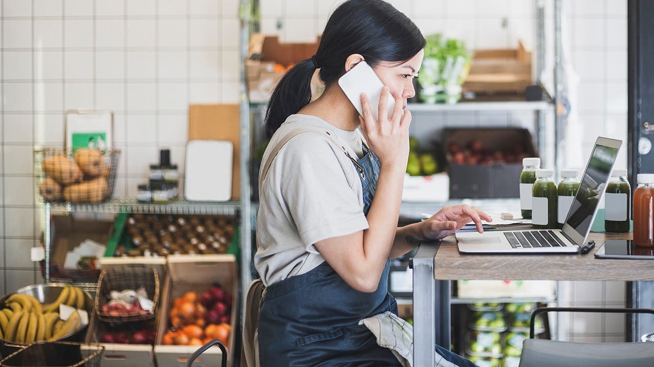 restaurant owner working on inventory