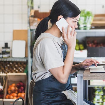 restaurant owner working on inventory