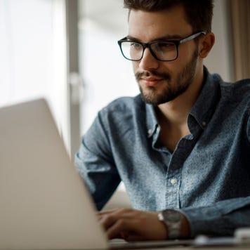 Young man working on laptop