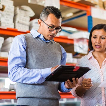 Two managers talking in a small business