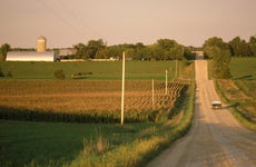 Long road in Minnesota countryside.