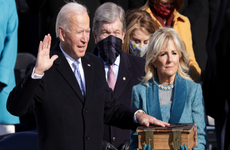 Joe Biden is sworn in as U.S. President as his wife Dr. Jill Biden stands beside him.
