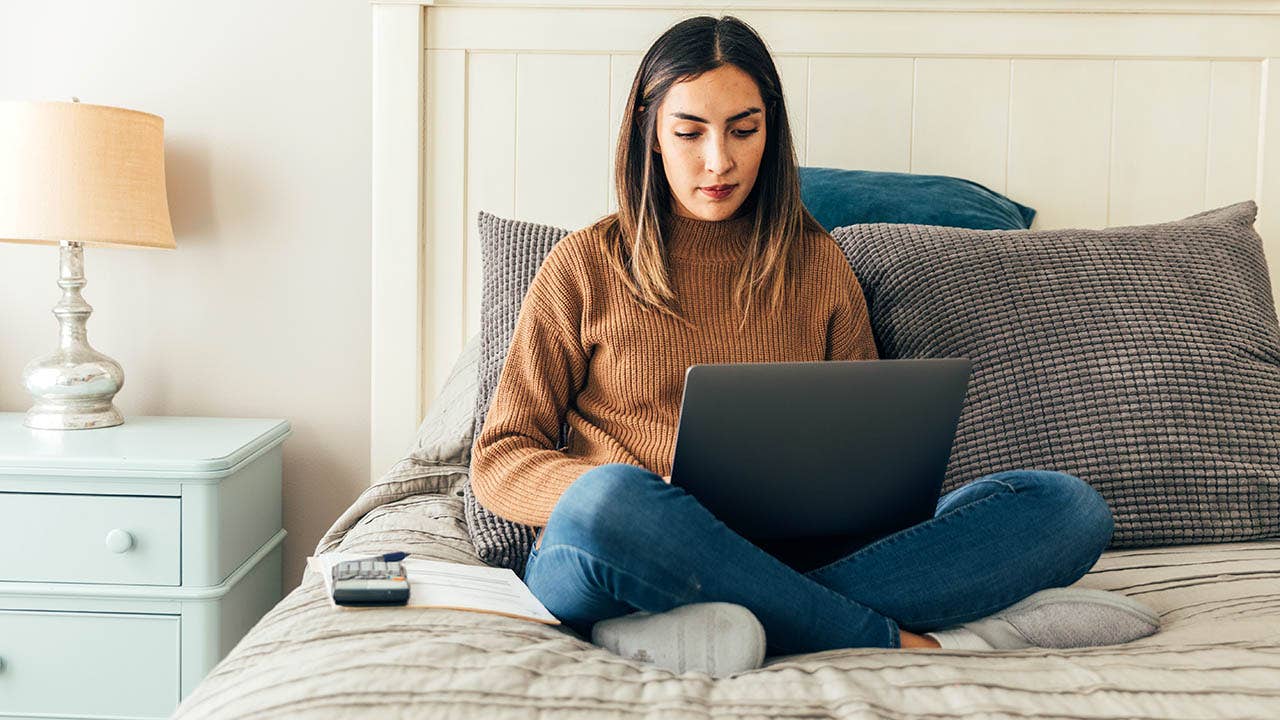 Woman Paying Bills and Banking Online