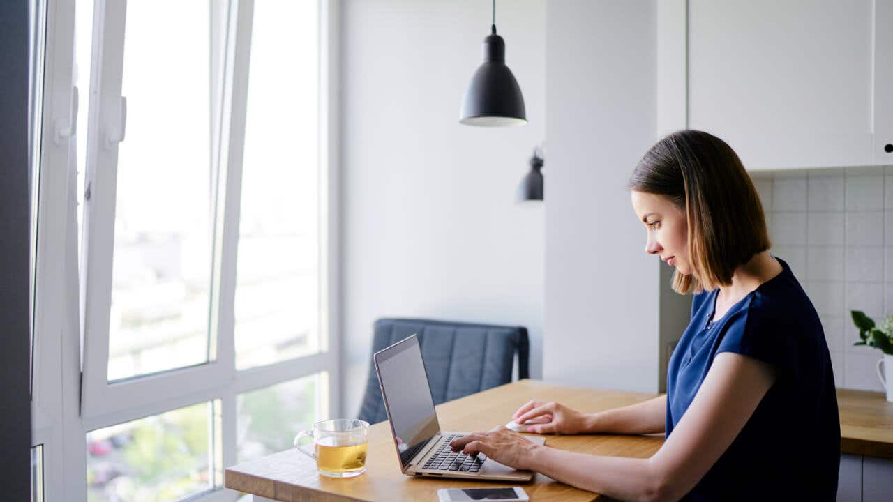 Woman paying bills