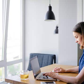 Woman paying bills