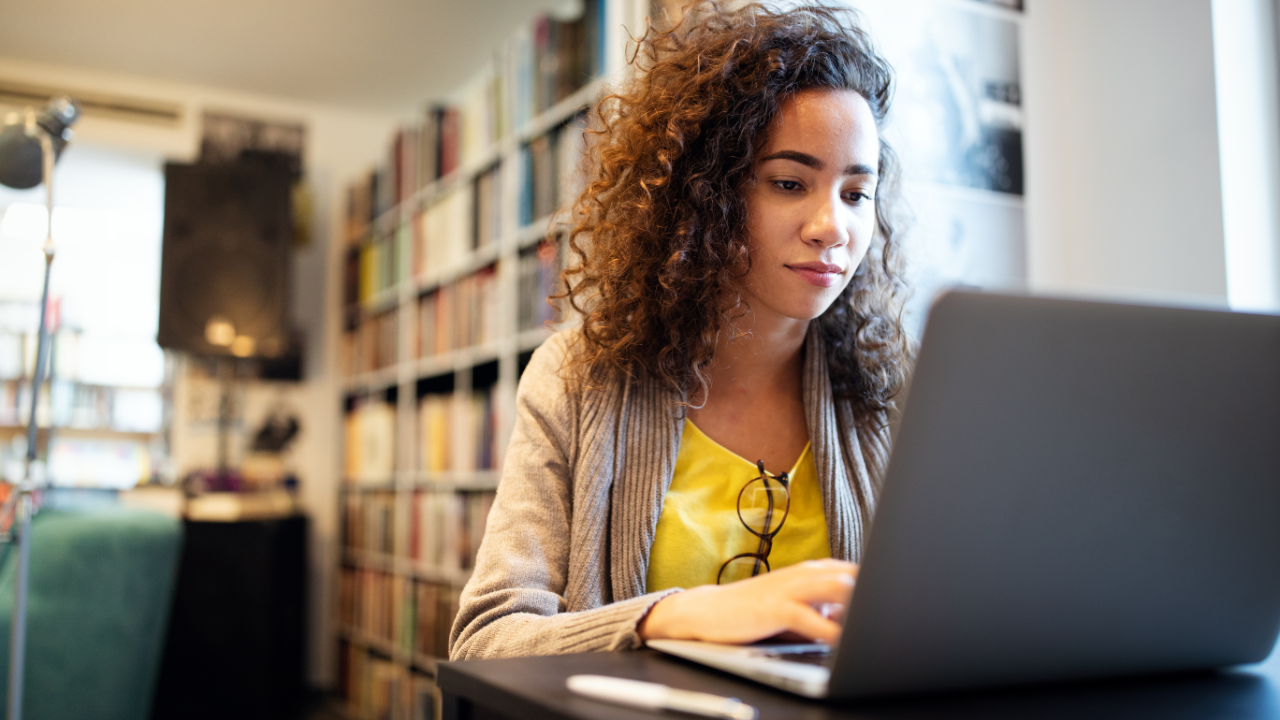 Student works in college library