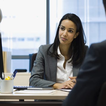 An insurance agent talking to clients
