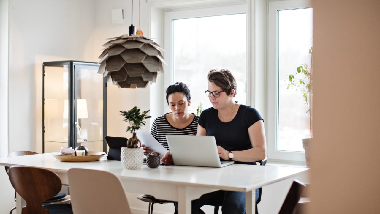 Lesbian couple reviewing their finances