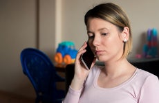 Young mother talking on phone