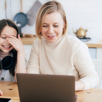 A woman and daughter work together