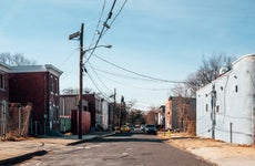 View of a semi-industrial street in a lower-income neighborhood.