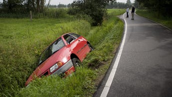 Car stuck in ditch