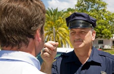 Cop performing an eye coordination test