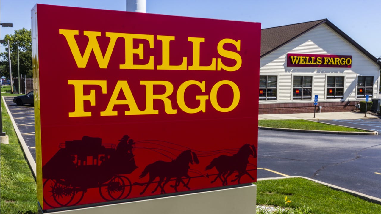 Wells Fargo sign outside of a retail bank branch