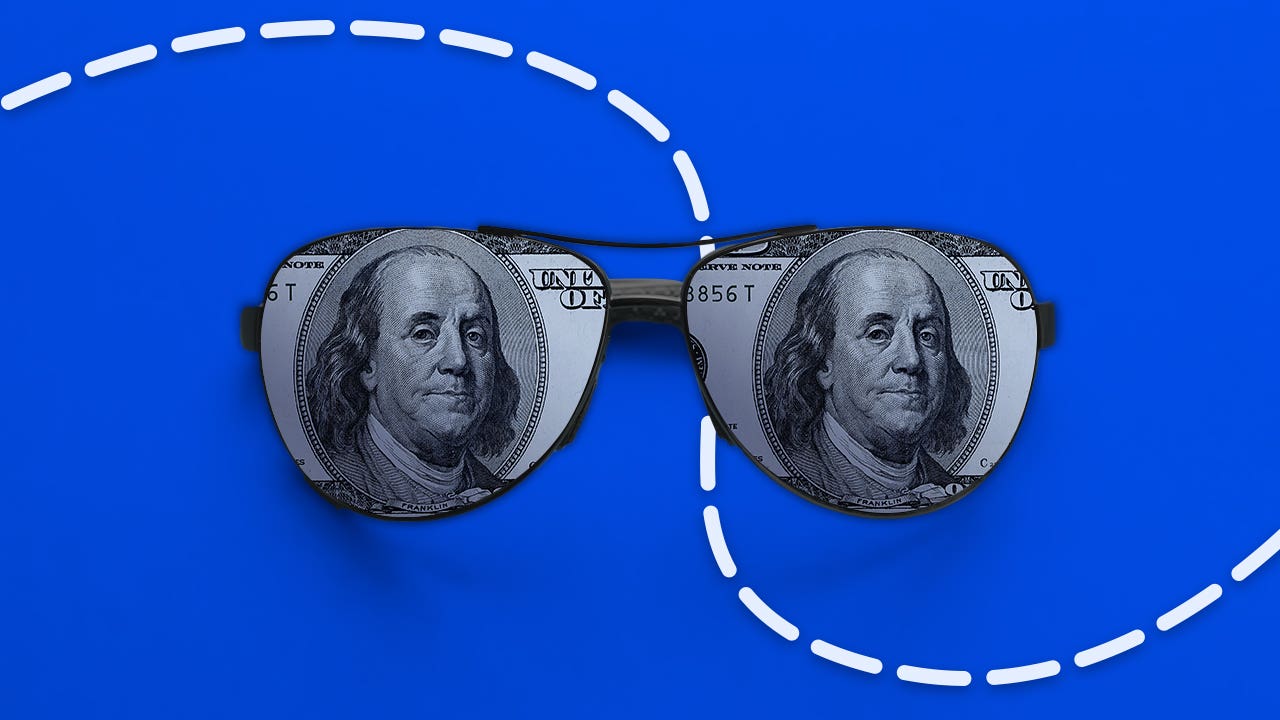 Sunglasses with dollar bills in the lenses