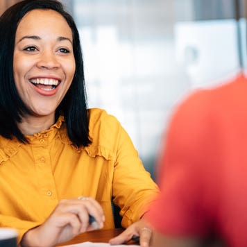 A mortgage professional meets with a prospective borrower