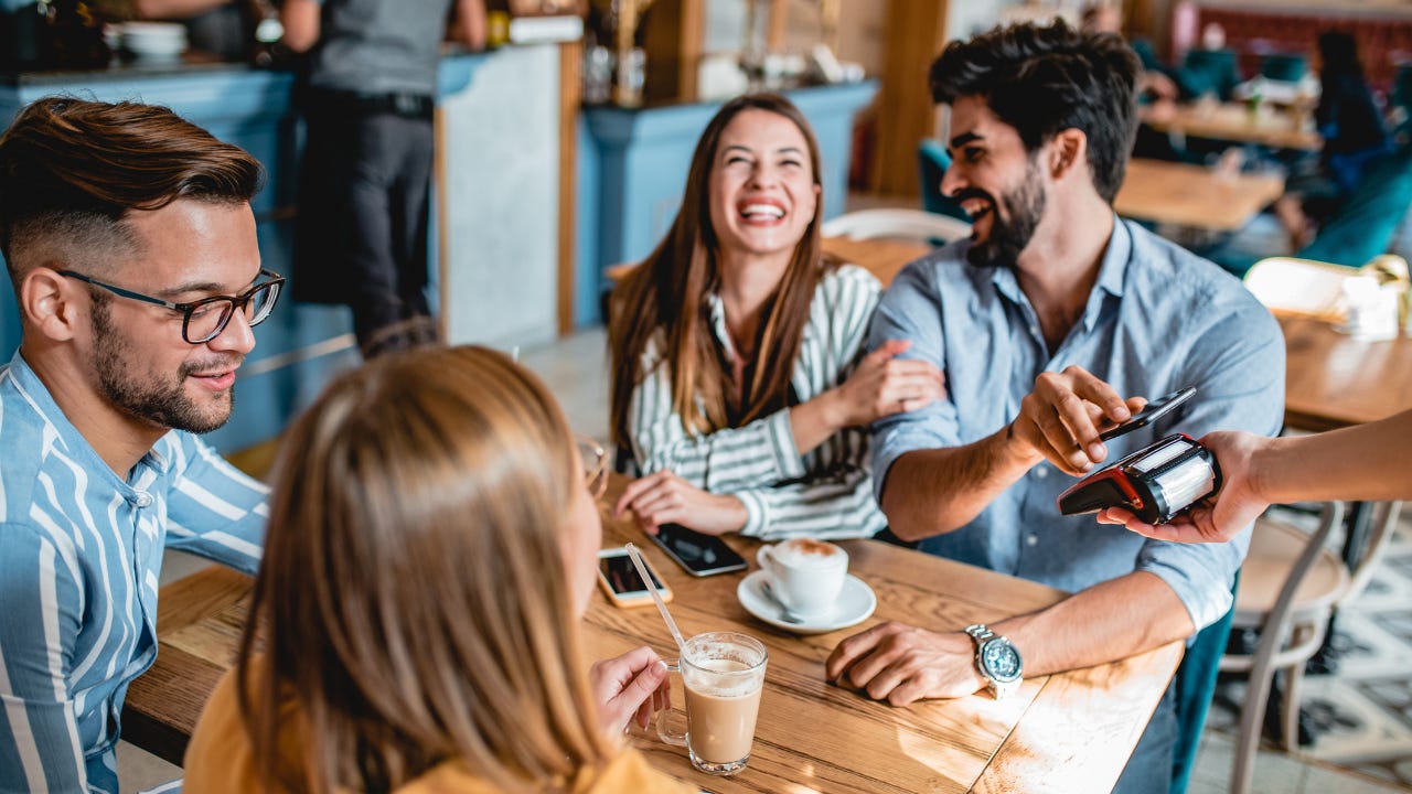 Group of friends enjoying coffee together