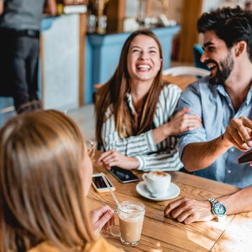 Group of friends enjoying coffee together