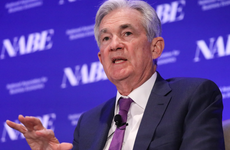 Chair Jerome Powell speaks during a business conference