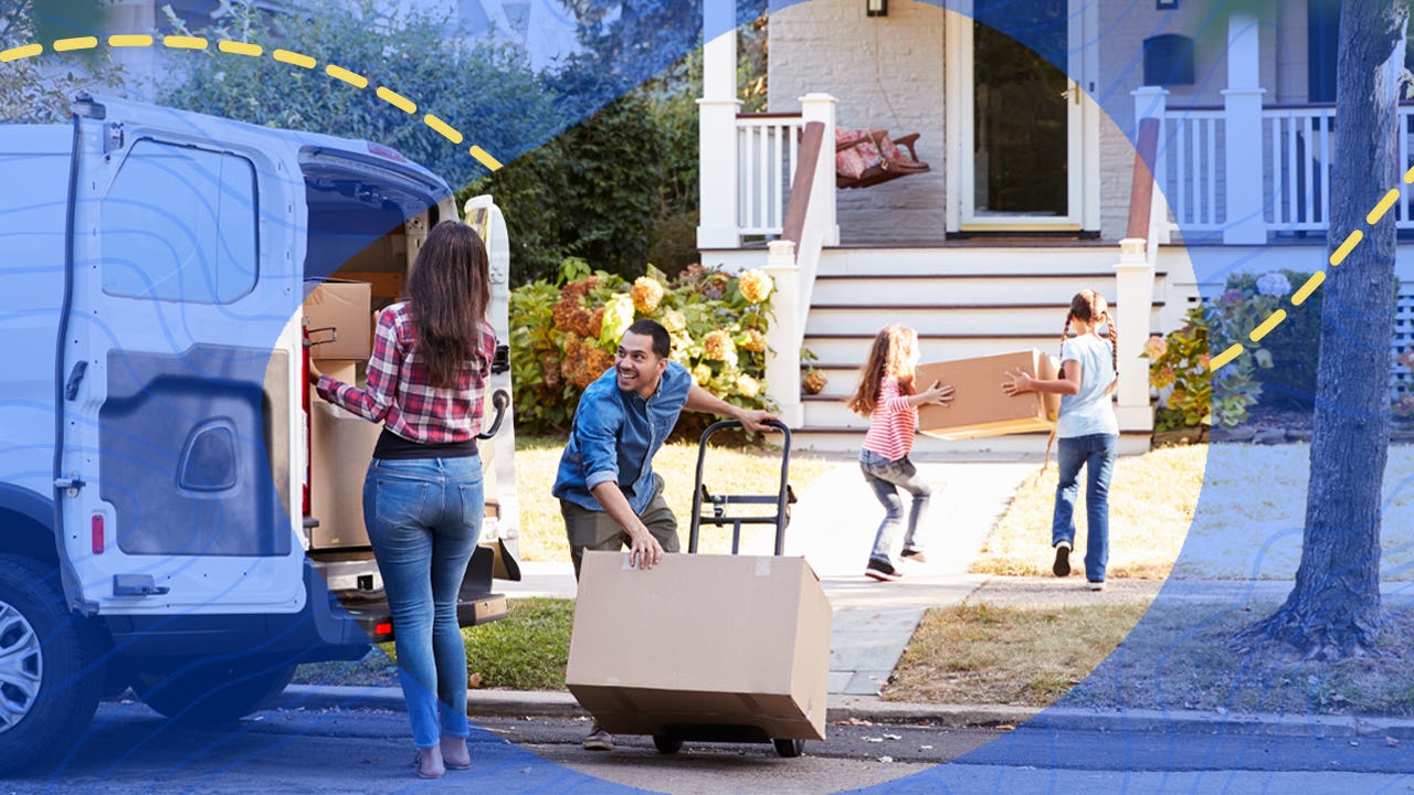 A young family unloading a moving van