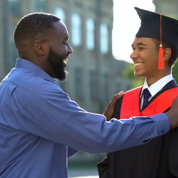 Father and son celebrate at college graduation