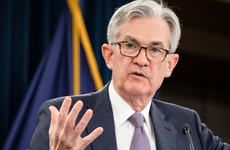 Federal Reserve Chairman Jerome Powell speaks to reporters at a post-meeting press conference.