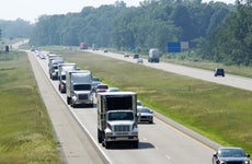View of the highway traffic with trucks lined up