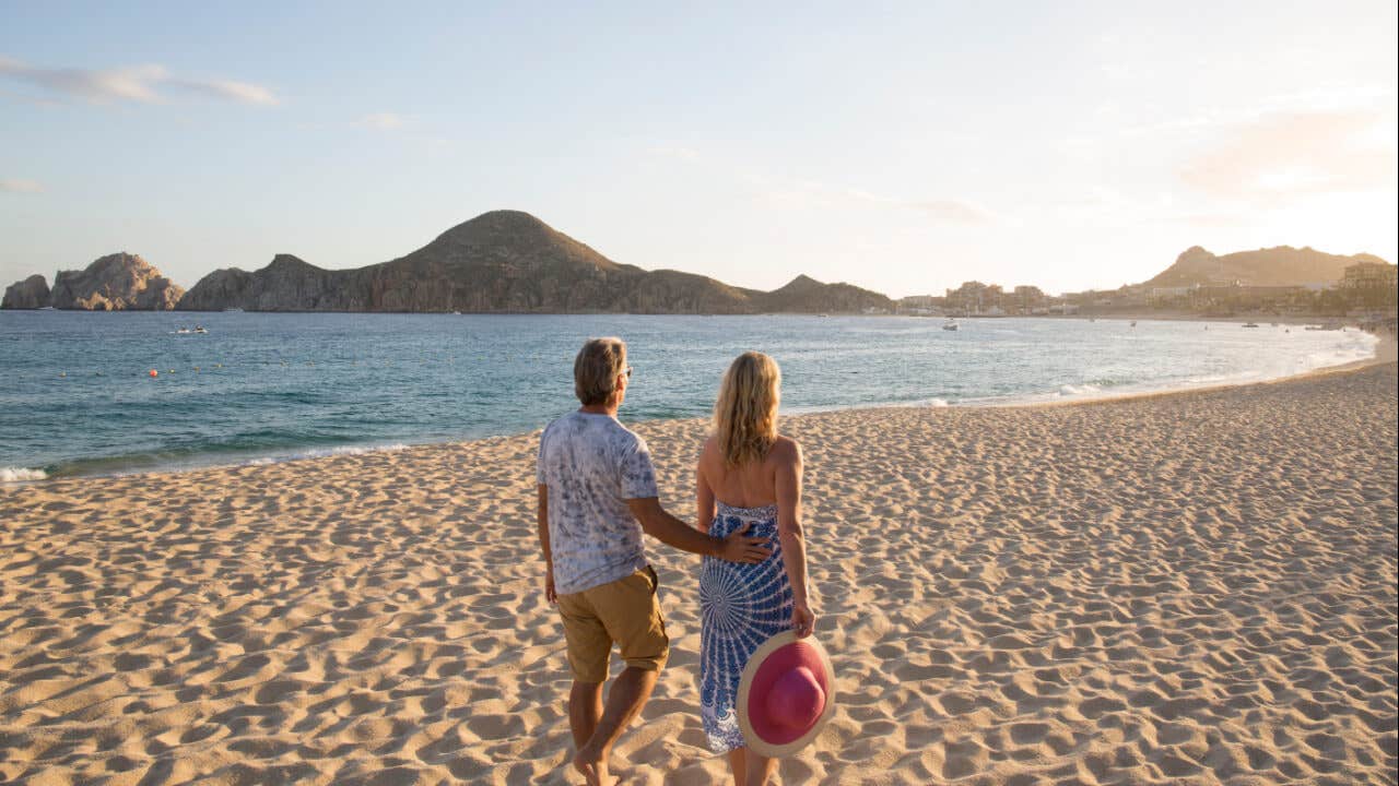 Couple walking on beach