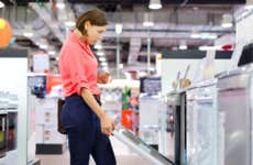 Woman shopping for dishwasher