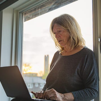 Senior lady on laptop - negative emotion