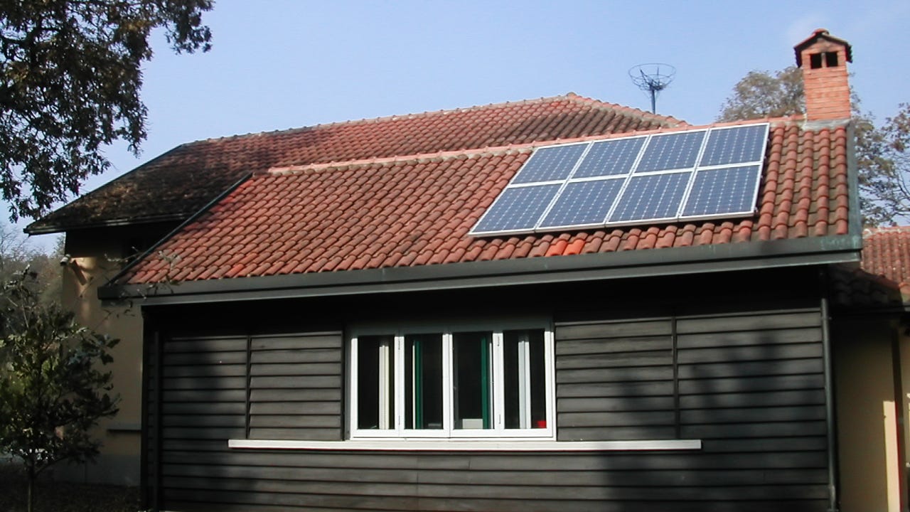 home with solar panels on the roof