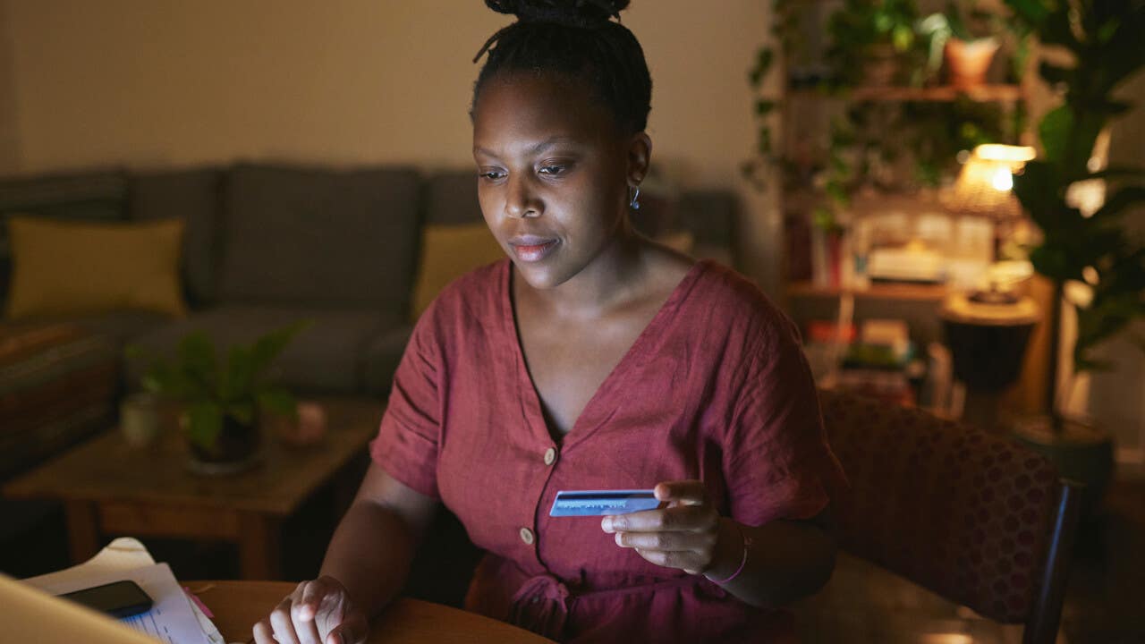 Woman paying credit card bill