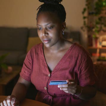 Woman paying credit card bill