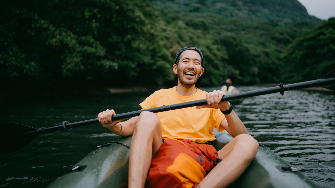 Man kayaking in scenic location