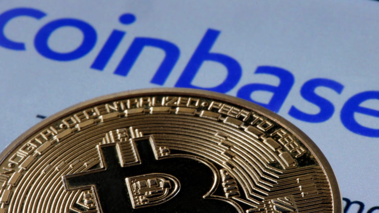 A picture of a bitcoin and the Coinbase logo