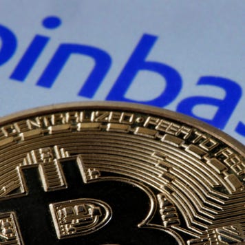 A picture of a bitcoin and the Coinbase logo