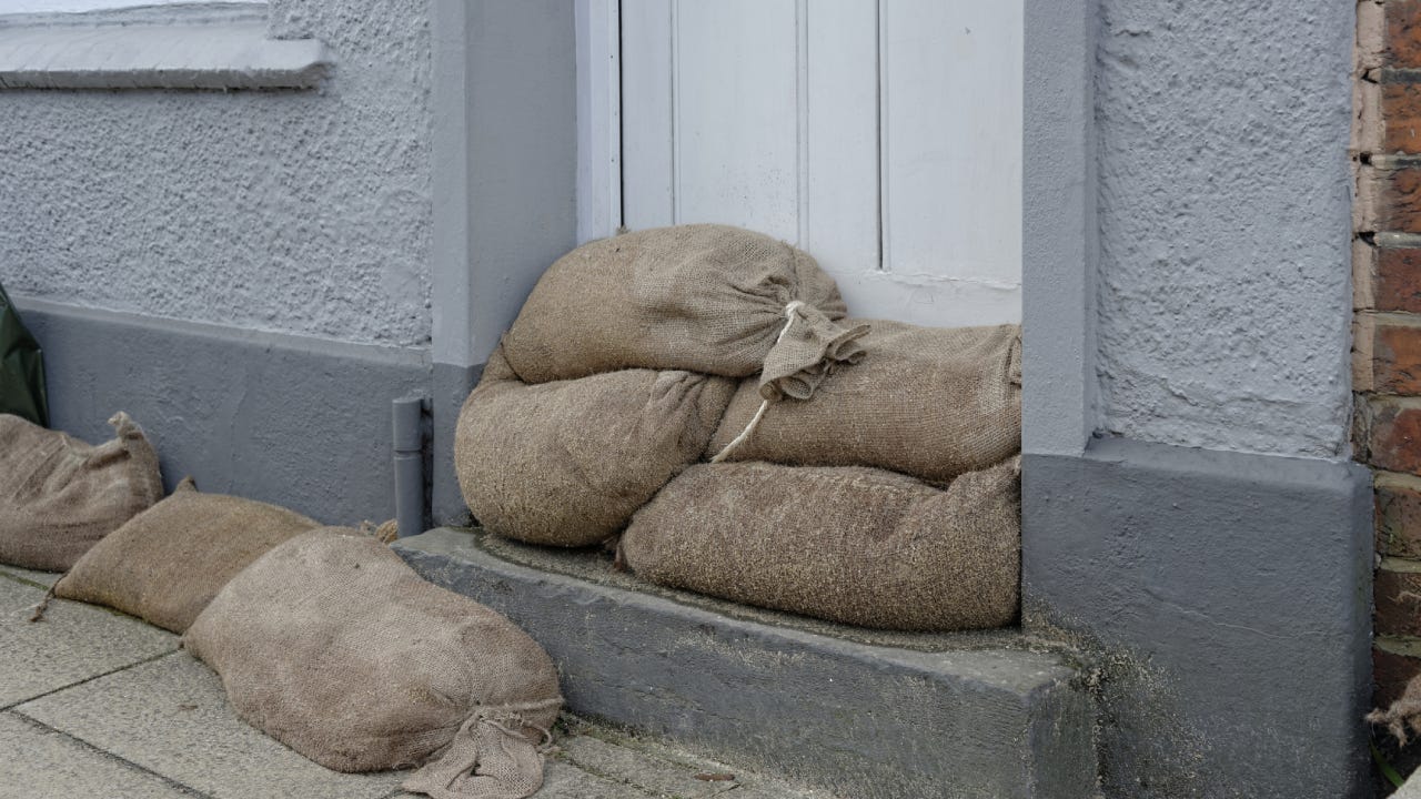 Sandbags Outside Front Door Of House to prevent flooding