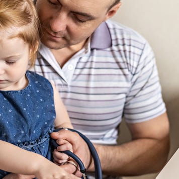A little girl gets a vaccination.