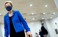 Sen. Elizabeth Warren walks through the Senate Subway