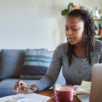 Woman paying bills